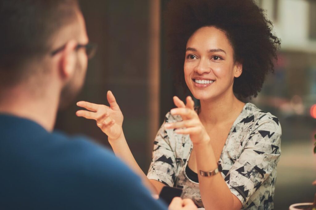 woman with curly hair talking about colorado counseling