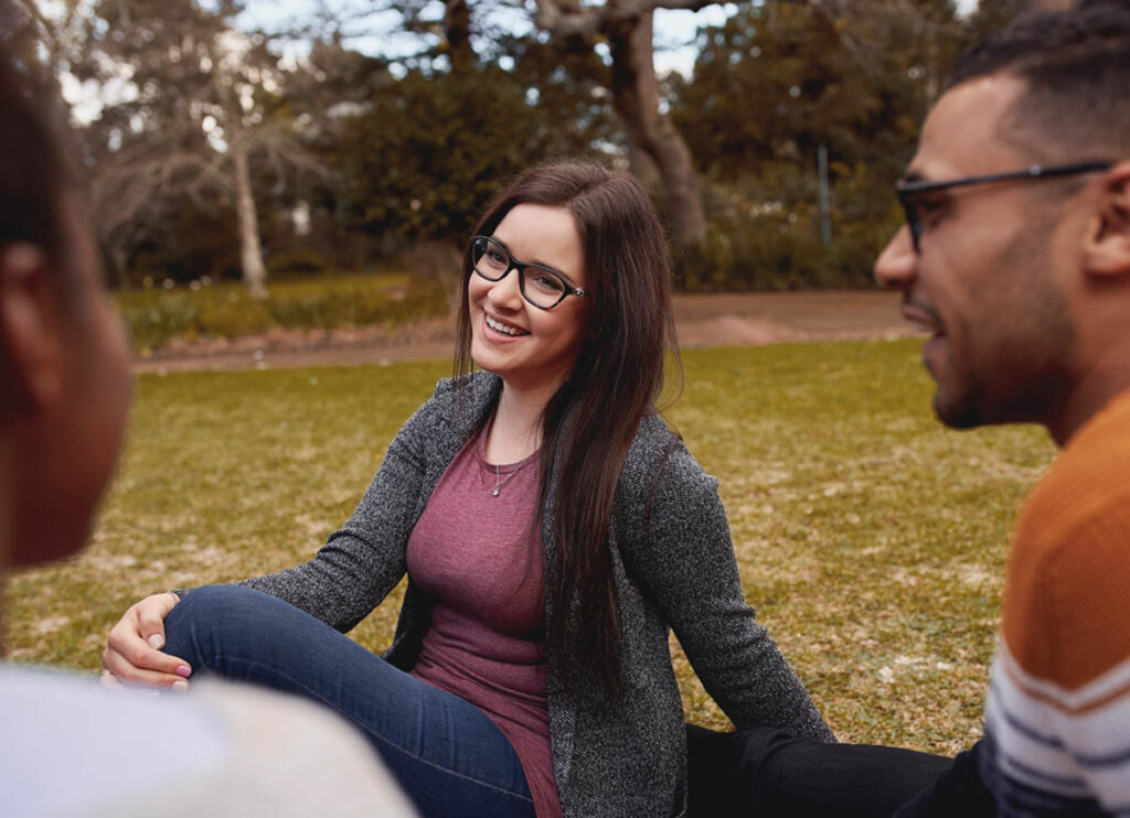 a woman is happy to celebrate national recovery month