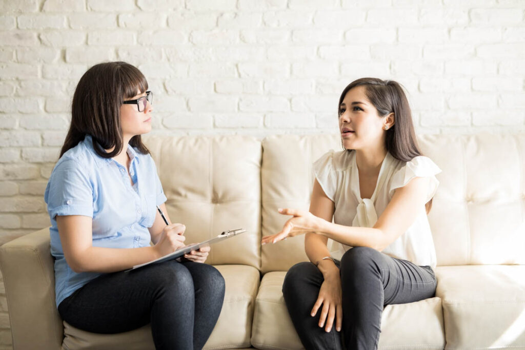 a woman participates in individual therapy for addiction