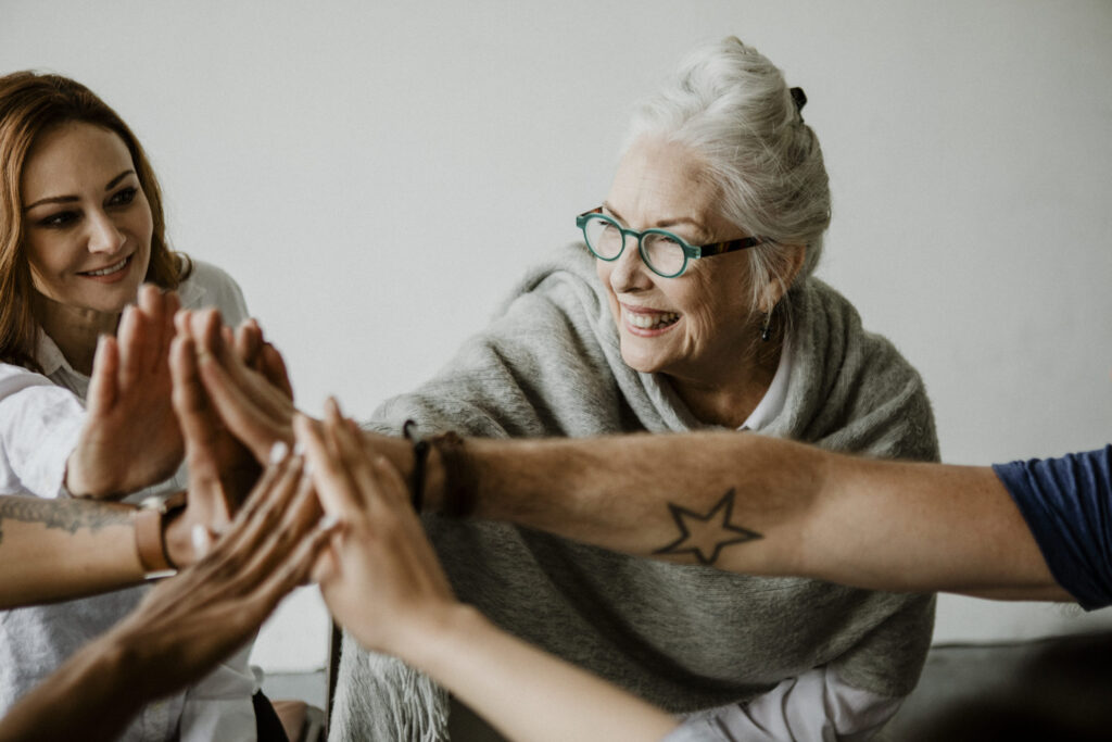 people in a support group practicing pro social behavior in recovery