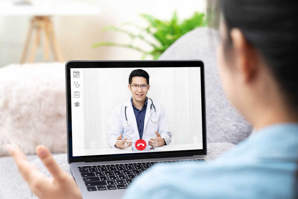 patient and doctor engage in telehealth treatment for mental health