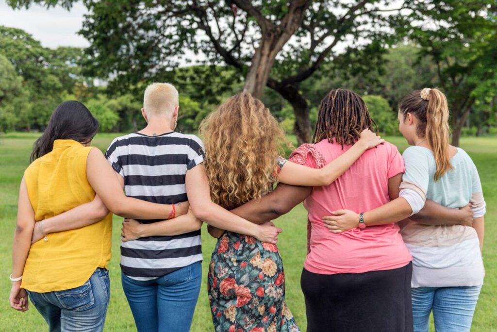 group of women with their backs turned in a women's rehab