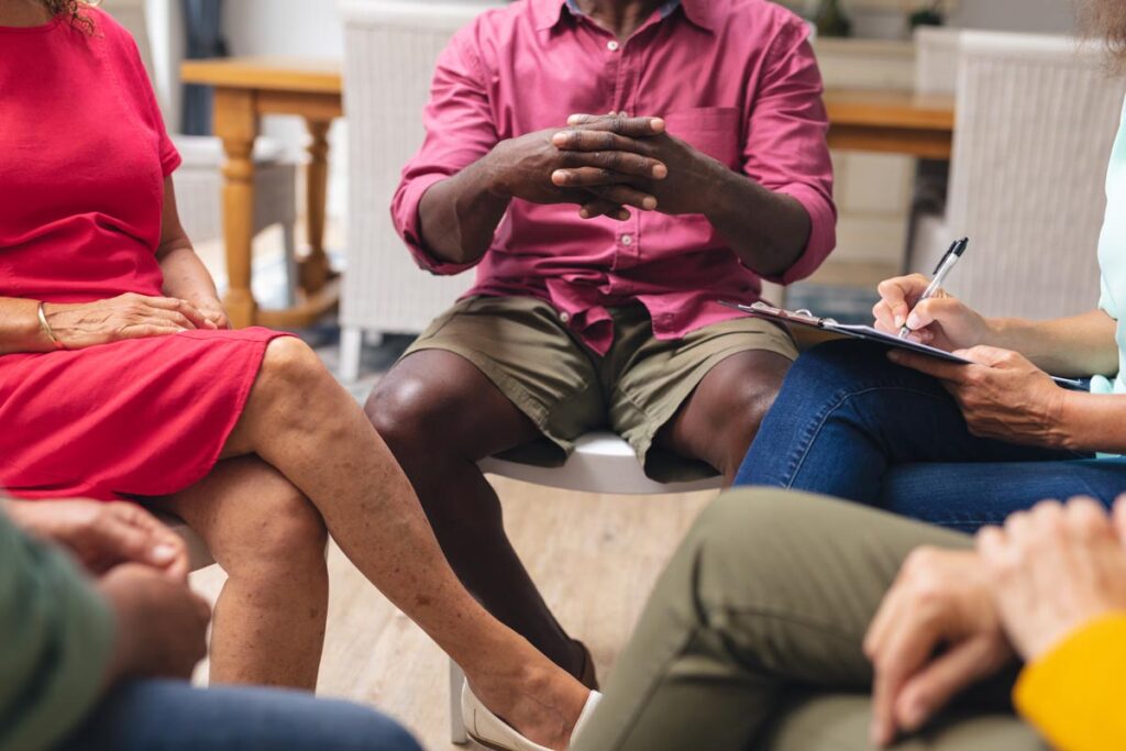 group in circle in an outpatient alcohol detox center discussing expectations