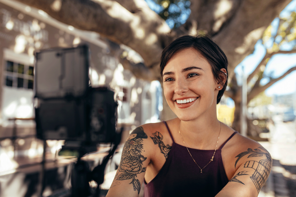 a woman is all smiles after completing a depression treatment program and getting her mental health to a better place