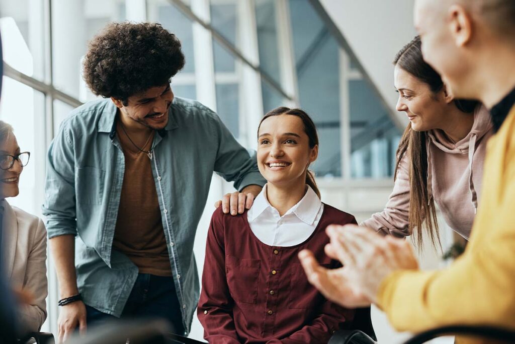 woman starting treatment leans about outpatient treatment program near me from her peers in group therapy