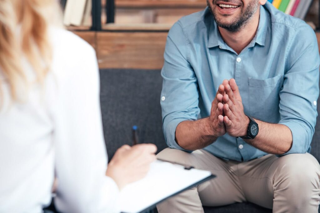 client talking to therapist in an opioid addiction treatment program